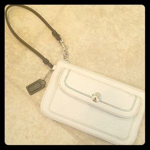 Coach white and black leather wristlet